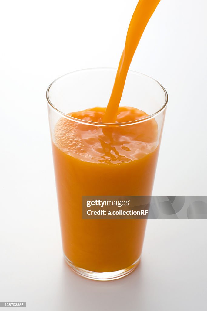 Vegetable Juice Being Poured