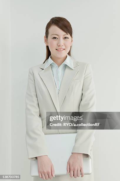 businesswoman using laptop - rf business stock pictures, royalty-free photos & images