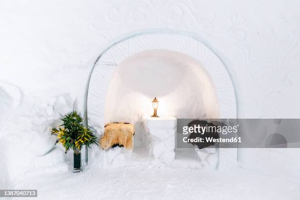 interior of igloo with dining area in alcove - igloo stock pictures, royalty-free photos & images