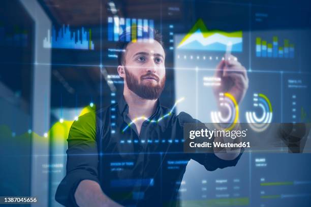 businessman working on digital display in control room at office - augmented reality stock pictures, royalty-free photos & images