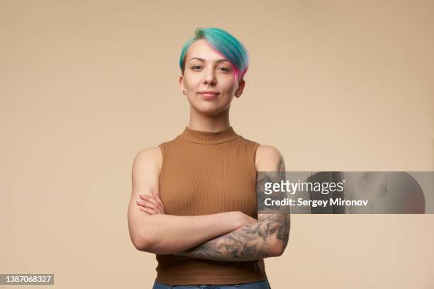 young attractive woman with green and pink hairs - tattoo design stock pictures, royalty-free photos & images