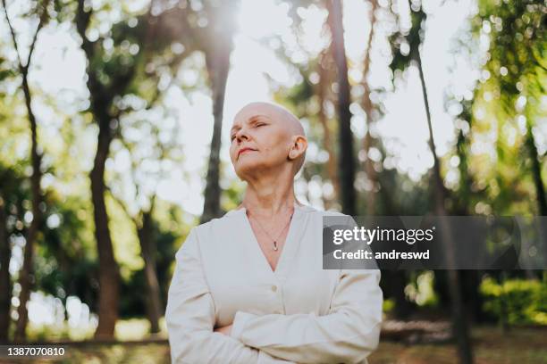 portrait of a woman with cancer oncology patient - hair loss bildbanksfoton och bilder