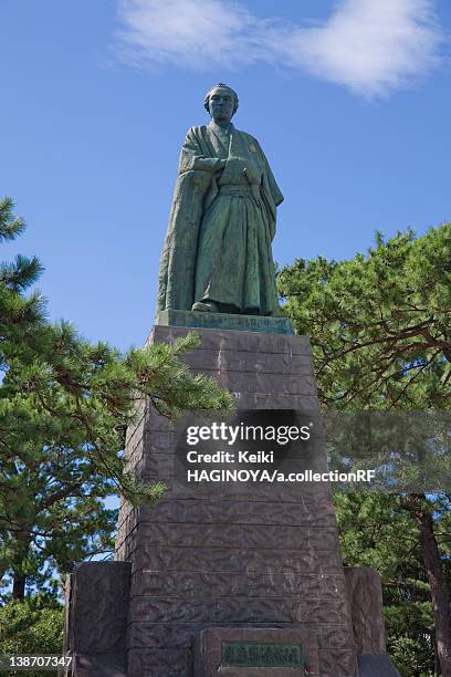 statue of sakamoto ryoma at katsurahama - ryoma sakamoto stock pictures, royalty-free photos & images