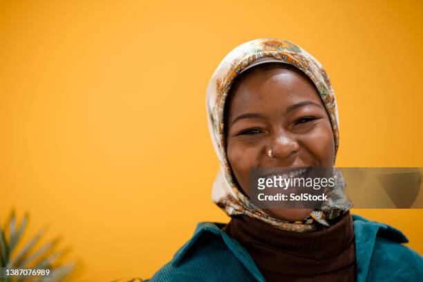 quirky student - hijab student stock pictures, royalty-free photos & images