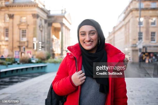 living her best life - hijab student stock pictures, royalty-free photos & images