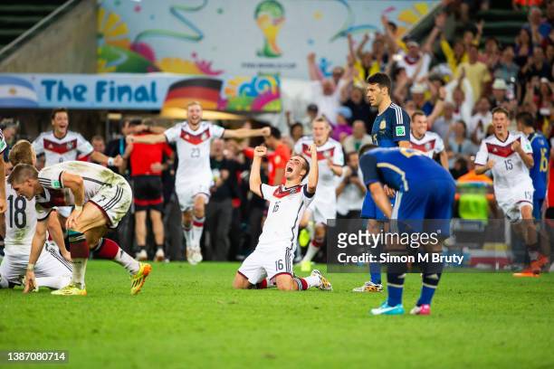 Philipp Lahm celebrates the final whistle and a win at the World Cup Final match between Germany and Argentina at the Maracana Stadium on July 13,...