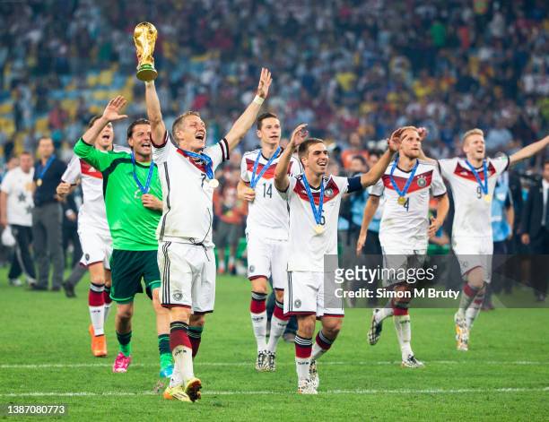 Bastian Schweinsteiger celebrates the World Cup victory with his teammates, Philipp Lahm, Benedikt Hoewedes, Andre Schuerrle, Julian Draxler and...