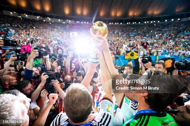 German players celebrate with the World Cup Trophy. World Cup Final match between Germany and Argentina at the Maracana Stadium on July 13, 2014 in...