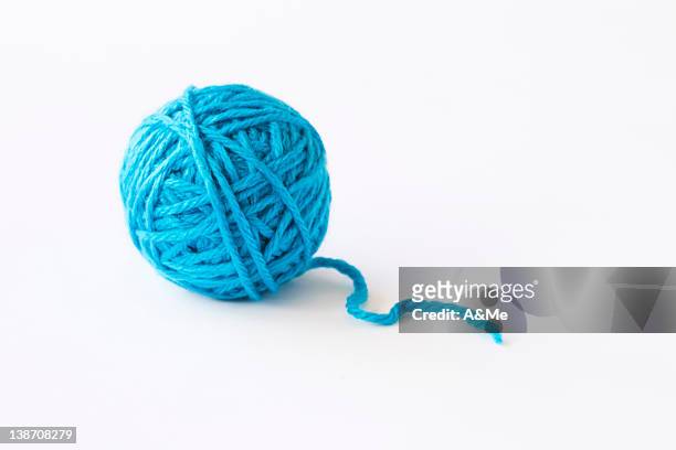 blue ball of wool, studio shot - wool ball foto e immagini stock