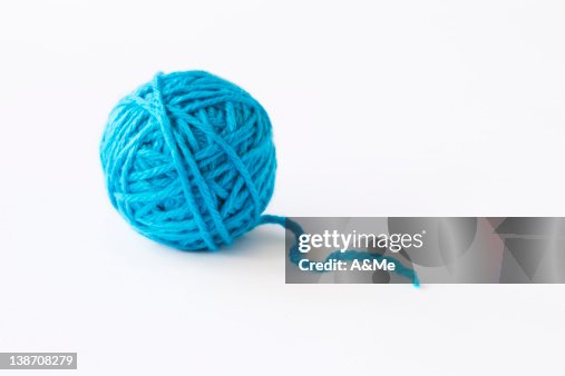 Blue ball of wool, studio shot