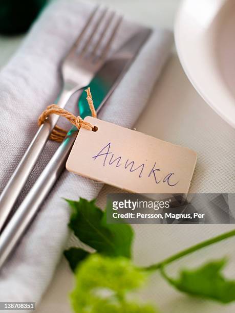 cutlery on napkin with place card - place card stock pictures, royalty-free photos & images
