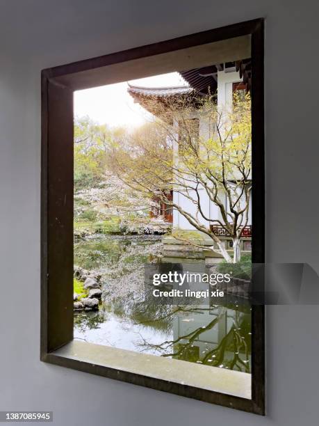 the scenery in the window of the chinese garden - open window frame stock pictures, royalty-free photos & images