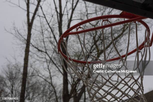 outdoor basketball goal & hoop & net - shooting baskets in driveway stock pictures, royalty-free photos & images