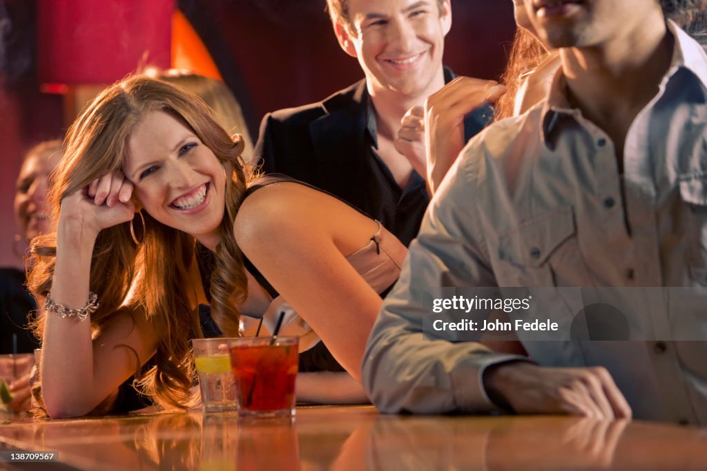 Friends drinking in nightclub