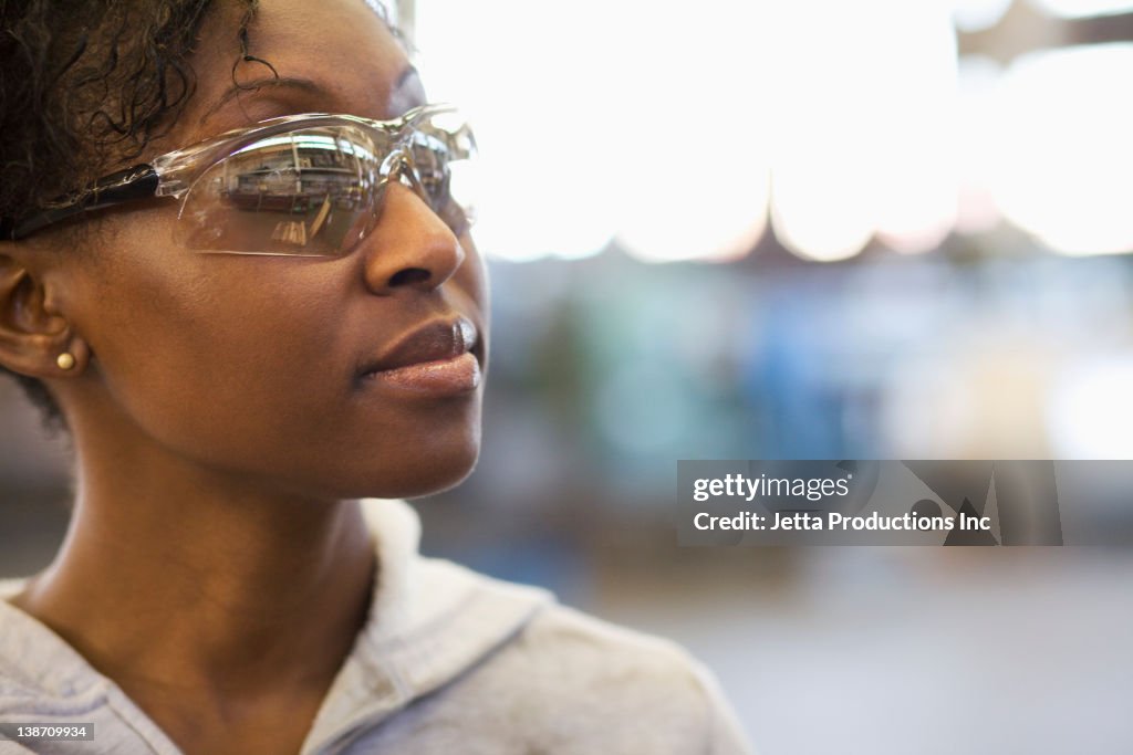 Black worker in protective eyewear