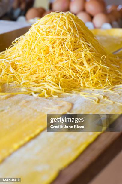 close up of fresh pasta noodles - utensili cucina stock pictures, royalty-free photos & images