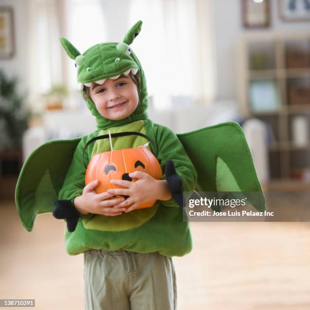 mixed race boy in halloween dragon costume - east region sweet stock pictures, royalty-free photos & images