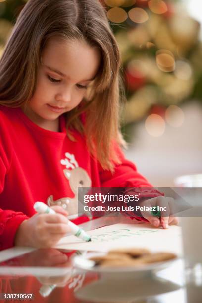 caucasian girl writing letter to santa - christmas colouring stock pictures, royalty-free photos & images