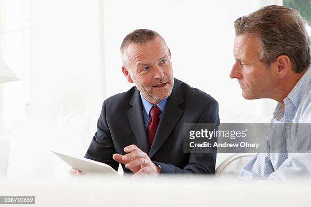 financial advisor talking to customer - customer profile stock pictures, royalty-free photos & images