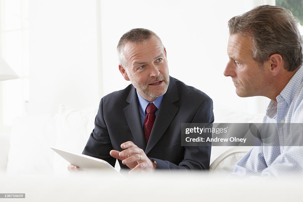 Financial advisor talking to customer