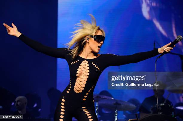 American singer Miley Cyrus performs on stage during a show at Movistar Arena on March 21, 2022 in Bogota, Colombia.