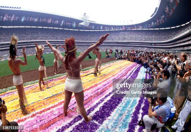 Performers in traditional dress at the 1986 FIFA World Cup opening ceremony prior to the opening game of the tournament at the Azteca Stadium on May...