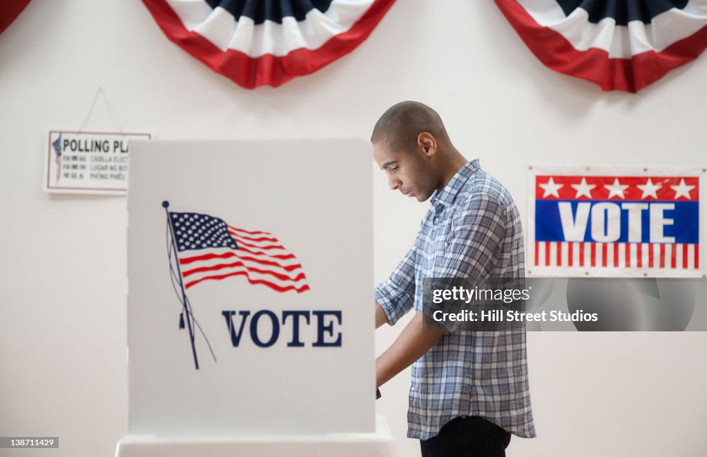 Man voting in polling place