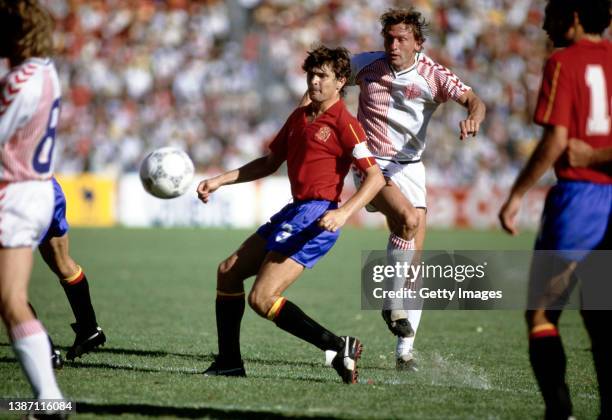 Denmark striker Preben Elkjær shoots at goal as Spain defender José Antonio Camacho looks on during the Round of 16 match at the 1986 FIFA World Cup...