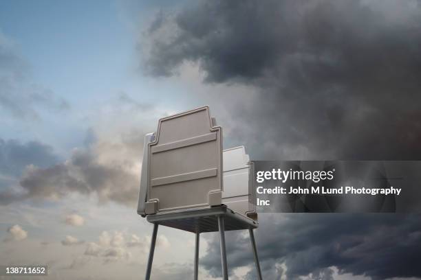 voting booth against stormy sky - voting booth stock pictures, royalty-free photos & images