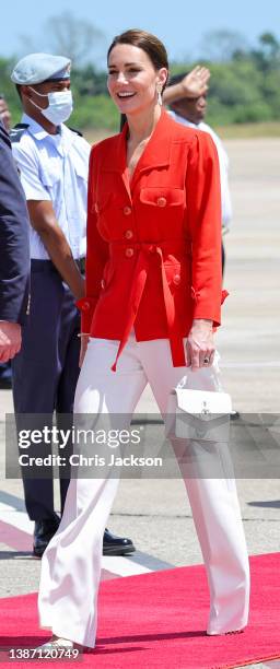 Catherine, Duchess of Cambridge departs Philip S. W Goldson International Airport on March 22, 2022 in Belize City, Belize. The Duke and Duchess of...