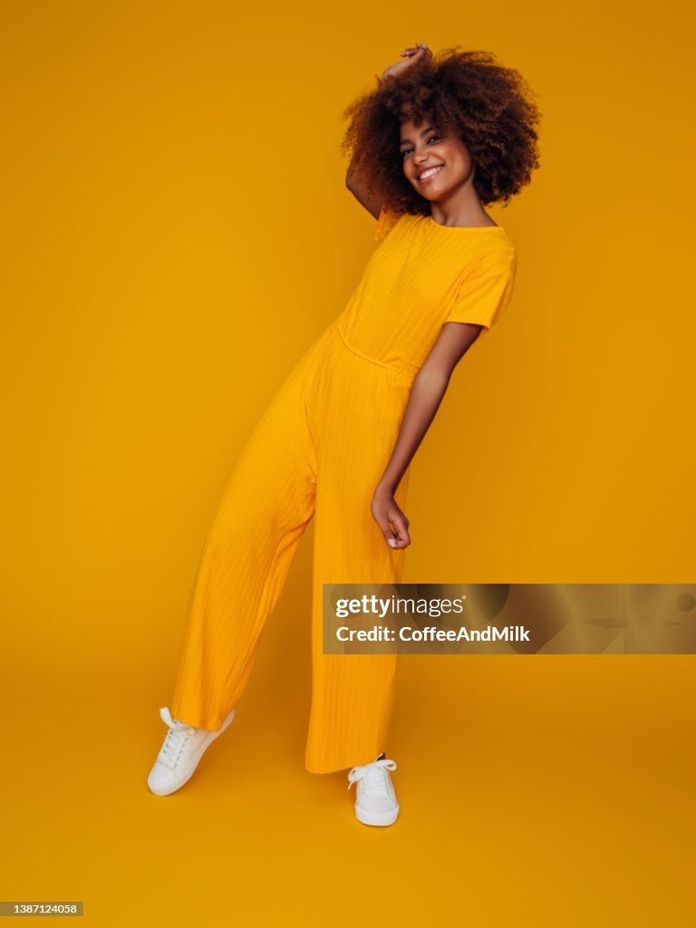 Beautiful girl with curly hairstyle