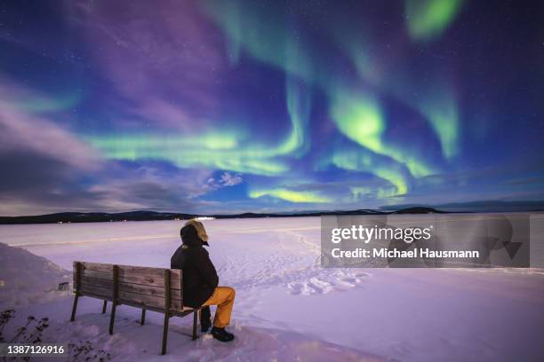 magic lights - finnland winter stock pictures, royalty-free photos & images