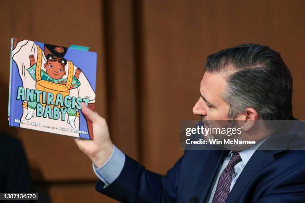 Sen. Ted Cruz holds up a book on antiracism as he questions U.S. Supreme Court nominee Judge Ketanji Brown Jackson during her Senate Judiciary...