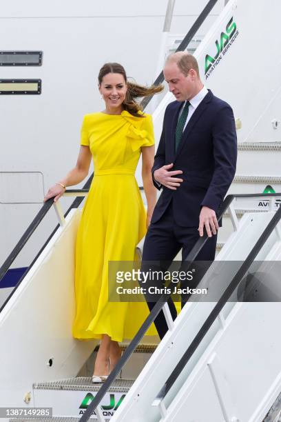 Catherine, Duchess of Cambridge and Prince William, Duke of Cambridge arrive at Norman Manley International Airport on March 22, 2022 in Kingston,...