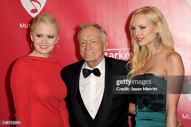 Kristina Shannon, Hugh Hefner, and Karissa Shannon arrive at the 2012 MusiCares Person of the Year Tribute To Paul McCartney held at the Los Angeles...