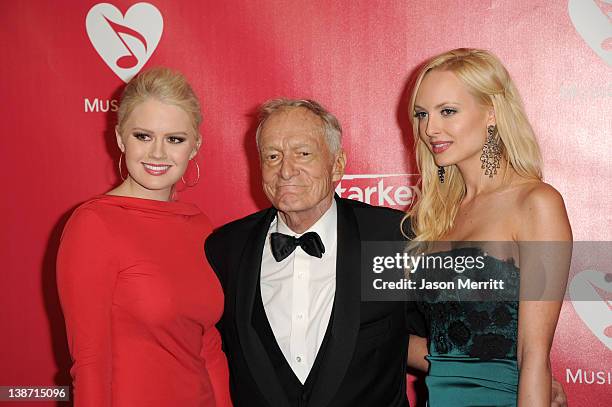 Kristina Shannon, Hugh Hefner, and Karissa Shannon arrive at the 2012 MusiCares Person of the Year Tribute To Paul McCartney held at the Los Angeles...