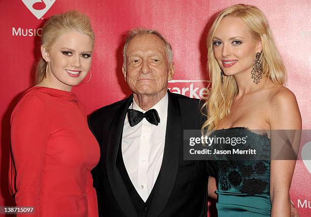 Kristina Shannon, Hugh Hefner, and Karissa Shannon arrive at the 2012 MusiCares Person of the Year Tribute To Paul McCartney held at the Los Angeles...