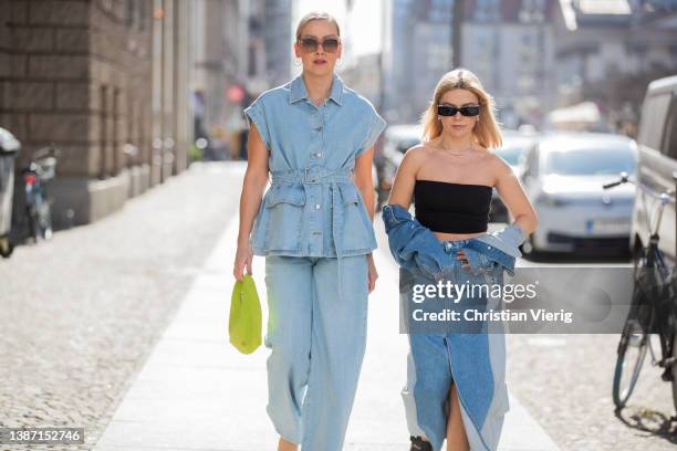 Tina Haase is seen wearing Selected Femme Denim vest & wide leg jeans, Mango crystal clear perspex heels, Loewe sunglasses, &other stories lemon...