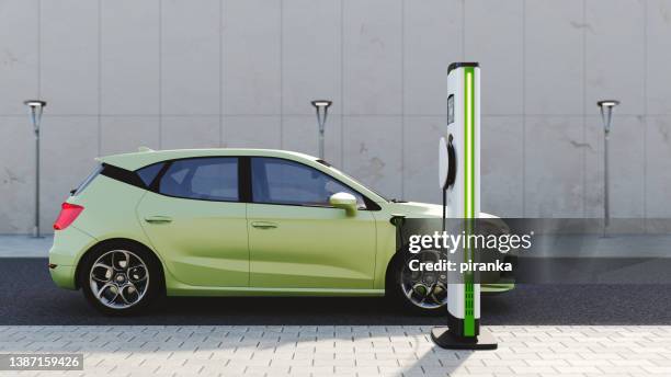 veicolo elettrico - stazione di ricarica per veicoli elettrici foto e immagini stock