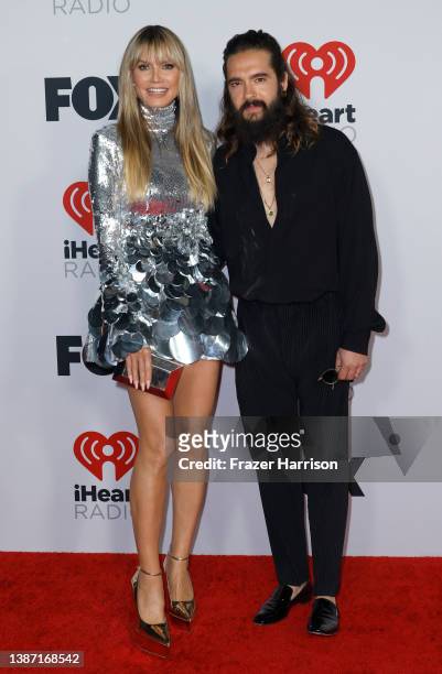 Heidi Klum and Tom Kaulitz attend the 2022 iHeartRadio Music Awards at The Shrine Auditorium in Los Angeles, California on March 22, 2022.