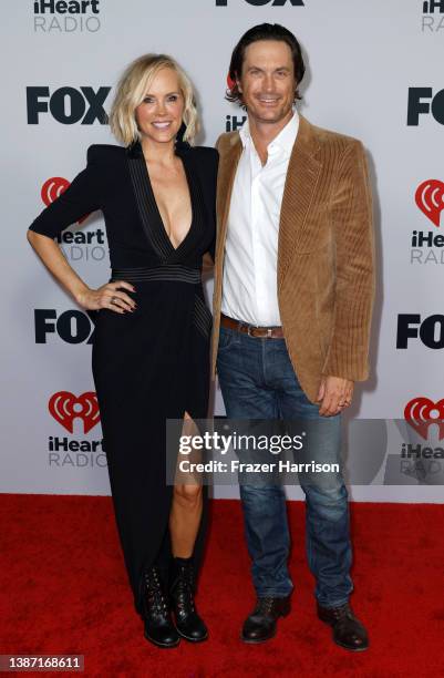 Erinn Bartlett and Oliver Hudson attend the 2022 iHeartRadio Music Awards at The Shrine Auditorium in Los Angeles, California on March 22, 2022.