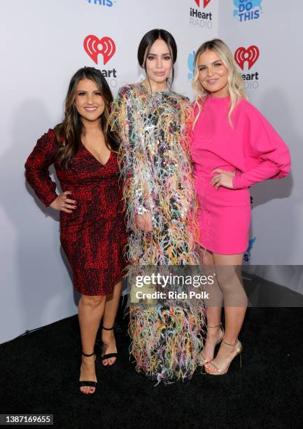 Sisanie, Sofia Carson, Tanya Rad attend the 2022 iHeartRadio Music Awards at The Shrine Auditorium in Los Angeles, California on March 22, 2022....
