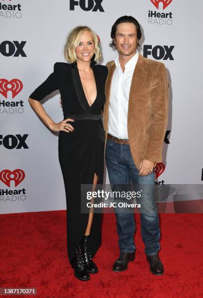 Oliver Hudson and Erinn Bartlett attend the 2022 iHeartRadio Music Awards at The Shrine Auditorium in Los Angeles, California on March 22, 2022....