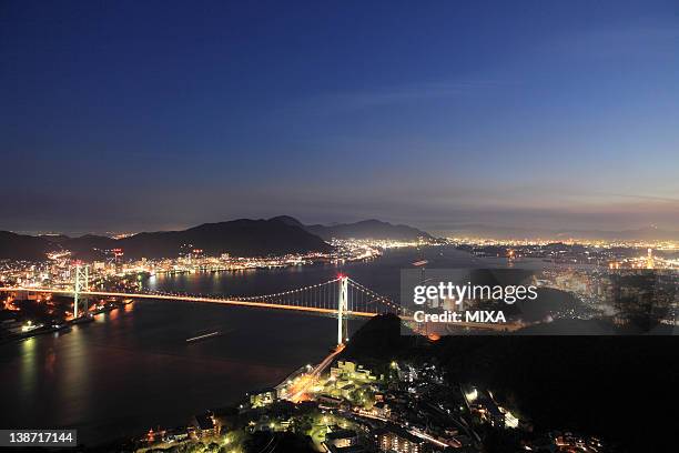 night view of kanmon straits, shimonoseki, yamaguchi, japan - 北九州市 個照片及圖片檔