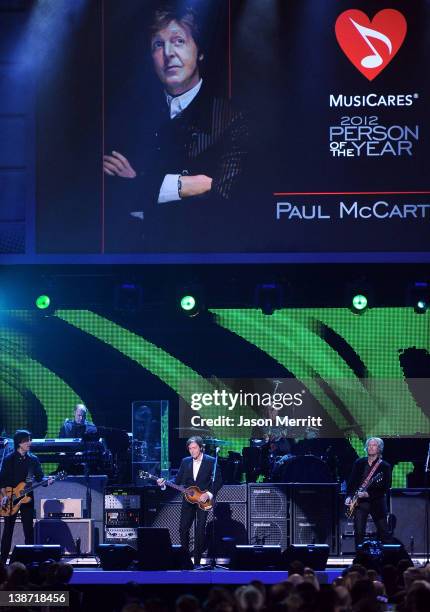 Musicians Rusty Anderson, Paul Wickens, Honoree Sir Paul McCartney, Abe Laboriel Jr, and Brian Ray perform onstage at the 2012 MusiCares Person of...