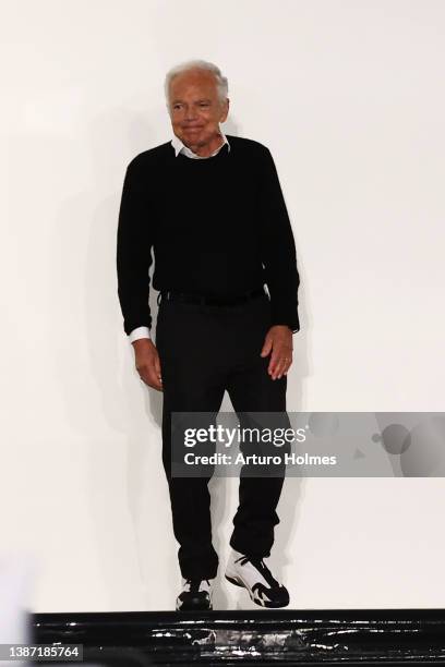 Designer Ralph Lauren waves during the runway finale at the Ralph Lauren Fall 2022 Fashion Show at the Museum of Modern Art on March 22, 2022 in New...