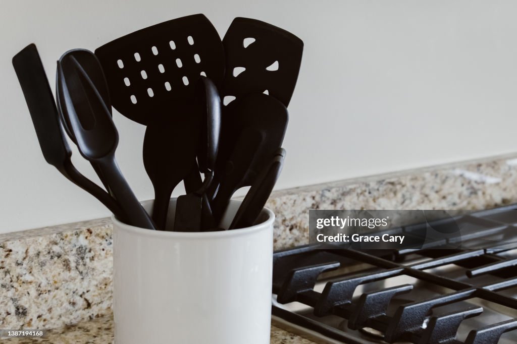 Cooking Utensils in Container on Kitchen Counter