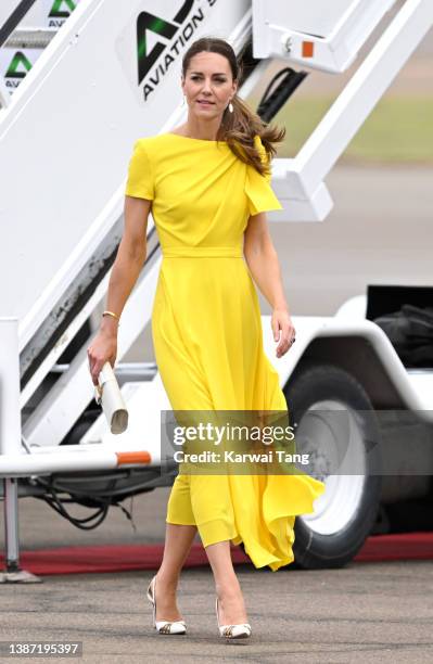 Catherine, Duchess of Cambridge arrives with Prince William, Duke of Cambridge at Norman Manley International Airport to visit Jamaica as part of...