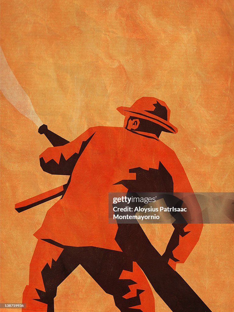 A fireman aiming a hose