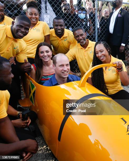 Prince William, Duke of Cambridge and Catherine, Duchess of Cambridge meet The Jamaica National bobsleigh team during a visit to Trench Town, the...